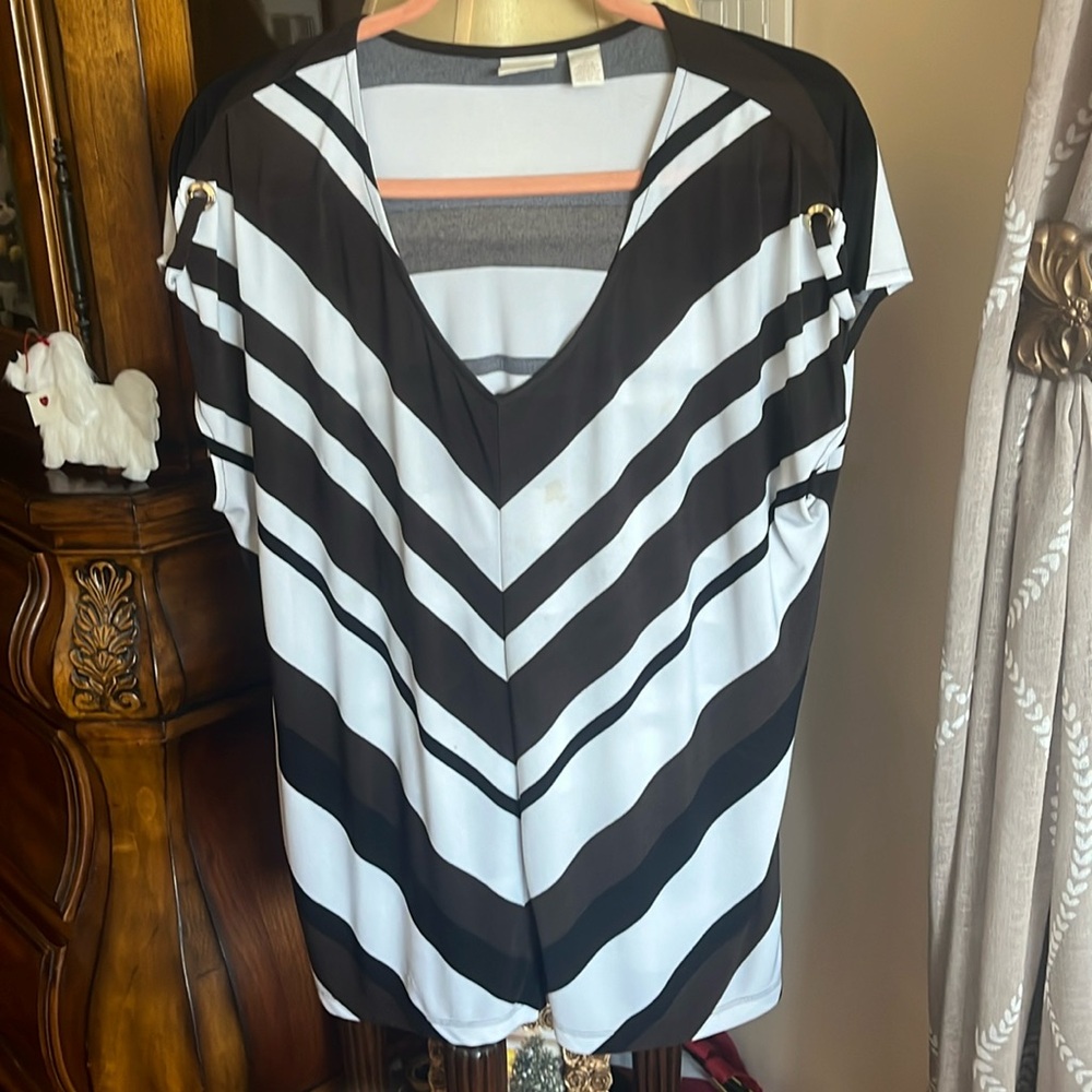 Stunning top from Chico’s size 2 (medium) with brown and white wide stripes.